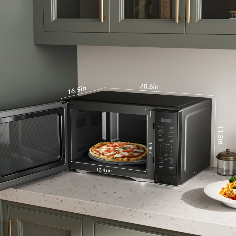Mainstays New 1.1 Cu ft Microwave Oven in Black Color