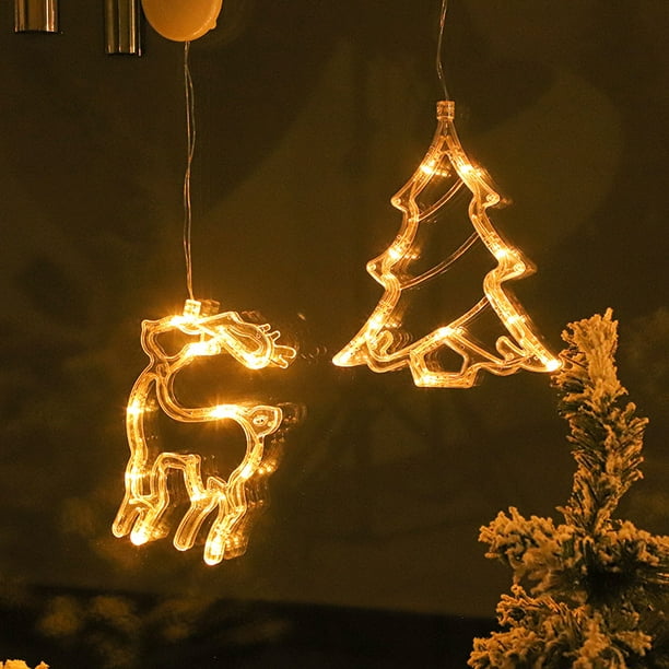 Décorations de lumières de silhouette de fenêtre de Noël à piles