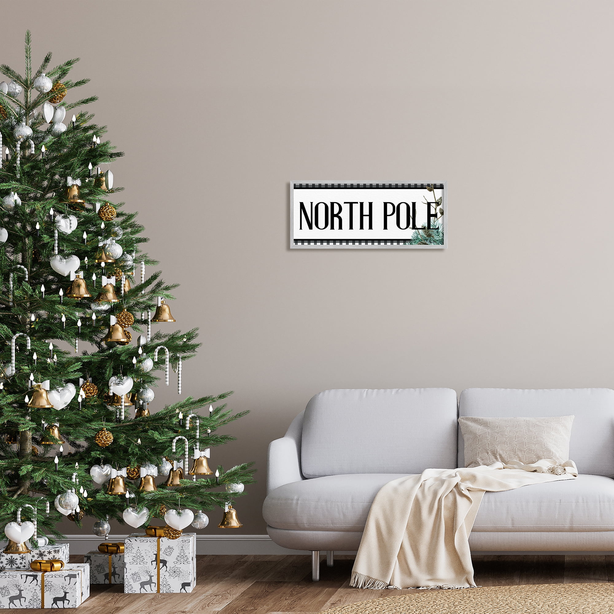 Stupell Industries North Pole Typography Black Plaid Winter Pinecone Foliage Graphic Art Gray Framed Art Print Wall Art, 24x10, by Kim Allen