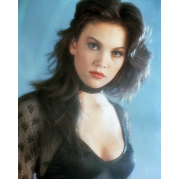 Diane Lane in low cut black dress chartreuse in 1984 Streets of Fire poster