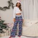 thumbnail image 1 of Pantalones casuales con cordones para mujer de Europa y América, pantalones holgados con cordones y estampado navideño a la moda, 1 of 6