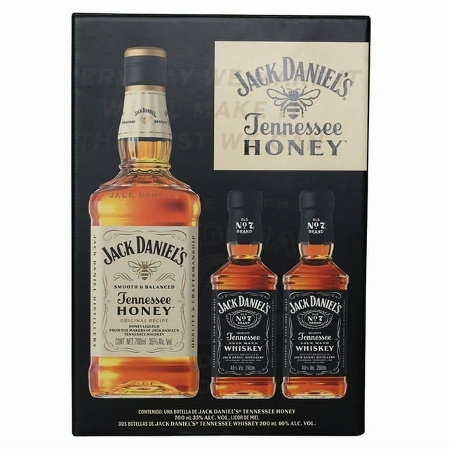 Whisky Jack Daniel's Honey 700 ml + 2 Jack Daniel's Tennessee 200 ml set showing a 700 ml bottle of Jack Daniel's Tennessee Honey with cream label and bee emblem, alongside two 200 ml bottles of Jack Daniel's Tennessee Whiskey with black labels, highlighting its filtrado a carbón de maple for suavidad and maturation in barricas de roble blanco americano, ideal para quienes buscan un licor de miel suave y equilibrado.