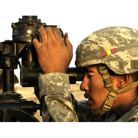 June 10 2006 - US Army soldier confirms the correct position of aiming reference poles with use of a gun sight on a M198-155mm Howitzer at Contigency Operating Base Speicher Poster