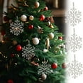 thumbnail image 1 of Adornos de copo de nieve de Navidad | Colgantes transparentes de 3 paquetes • Plástico ligero | Decoración de boda de invierno • Fácil de colgar • Decoraciones ideales para el árbol de Navidad, 1 of 9