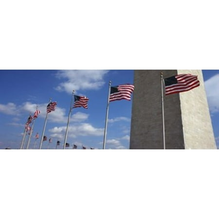 American flags in front of an obelisk Washington Monument Washington DC USA Canvas Art - Panoramic Images (36 x