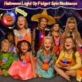 thumbnail image 6 of Monebena 15 Pack Halloween Spin LED Necklaces Toys Party Favors Toys for Kids 15 Styles Spider Ghost Halloween Light Up Trick or Treat Toys Goodie Bag Filler Glow in The Dark Party Supplies M01, 6 of 7