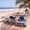 Set of 2 white, green, blue, and cyan striped items, variant on GlowSol 3-in-1 Foldable Adult Beach Chair, Portable Backpack Lounger with Face Hole, Adjustable Footrest, 5 Recline Positions, Storage Pocket, Cup Holder & Towel Bar, Lightweight Outdoor Chair