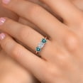 thumbnail image 4 of Gem Stone King 18K Rose Gold Plated Silver Lab Grown Diamond and Blue Moissanite Engagement Ring for Women | 1.50 Cttw | Round 5MM | Gemstone April Birthstone | Size 8, 4 of 6