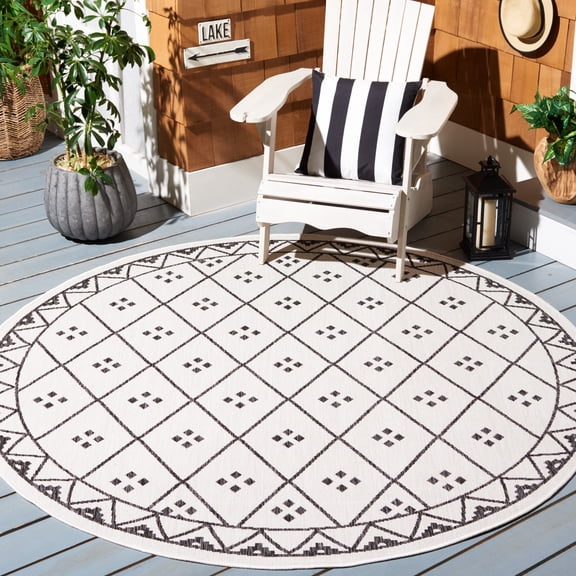 SAFAVIEH Courtyard Wasif Geometric Indoor/Outdoor Area Rug, Ivory/Black, 6'7" x 6'7" Round