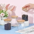 thumbnail image 3 of Paquete de 4 frascos de vidrio transparente con tapas de bambú, 200 ml (7 oz), pequeños y herméticos, redondos, para almacenar especias, azúcar y sal. Incluyen tapas con anillo de silicona., 3 of 5