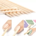 thumbnail image 1 of Empuja Cutícula Set de Palitos De Naranjo Manicura Uñas 100 Piezas Belié Palitos, 1 of 5