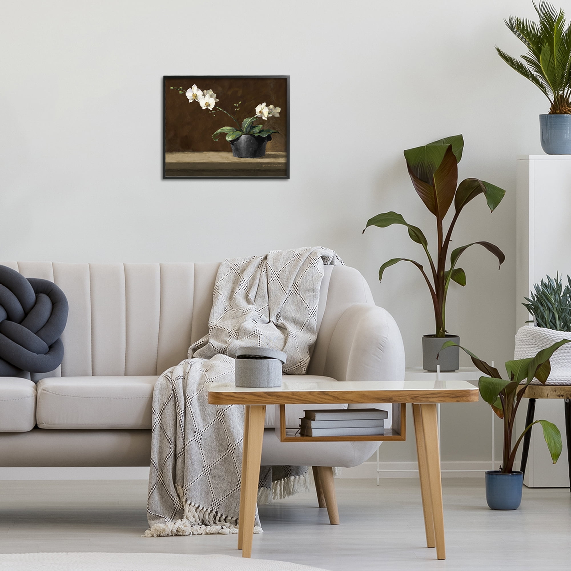Stupell Industries Potted White Orchid on Ledge Black Framed Giclee Art, design by Yumiko Ichikawa