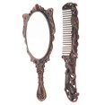 thumbnail image 2 of Here's a polished product description and details for the **Vintage Compact Mirror and Comb Set**:\n\n \n\n### **Vintage Compact Mirror and Comb Set –, 2 of 5