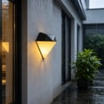 thumbnail image 1 of Lámpara de pared solar para exteriores, luz ambiental decorativa para jardín, patio, camino, geométrica moderna, plástico negro, 1 of 6