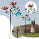 thumbnail image 1 of Molino de Viento Grande de Metal con Tres Flores y Mariposas Giratorias para Decoración de Exteriores de Jardín y Patio., 1 of 7