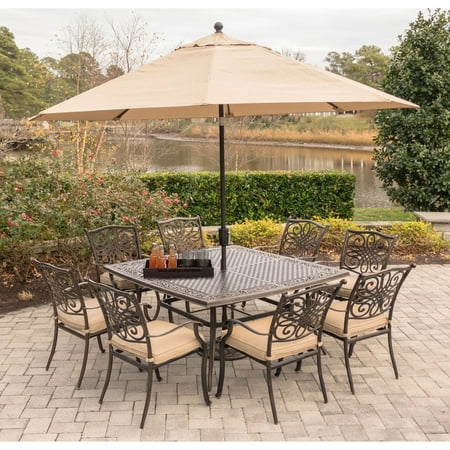 Hanover Outdoor Traditions 9-Piece Dining Set with 60 Square Cast-Top Table 8 Stationary Chairs and Umbrella w/Stand in Natural Oat