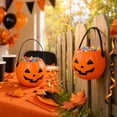thumbnail image 6 of Kumdkdwn Halloween Pumpkin Candy Bucket – 4.7" Plastic Trick or Treat Pail – Classic Jack-o'-Lantern Candy Holder with Handle for Party Favors, Fall Decor & Kids Costumes, 6 of 7