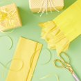 thumbnail image 2 of 24 Packs: 12 ct. (288 total) Yellow Tissue Paper by Celebrate It, 2 of 3