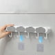 thumbnail image 4 of Organizador de soporte para escoba de trapeador montado en la pared | Estante de almacenamiento resistente con 4 ranuras de sujeción y 5 ganchos móviles | Plástico, Blanco, 14.4" | Organizador de, 4 of 8