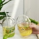 thumbnail image 4 of Vaso de vidrio con pajita y tapa, taza para beber jugo caliente de 430ML, taza transparente para batidos de café para viajes en casa al aire libre, 4 of 5