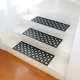 thumbnail image 1 of Rubber-Cal 10-104-000-6PK Stars Step Mat Peldaños de goma para escaleras, negro, 10"" x 29,75"", 1 of 5