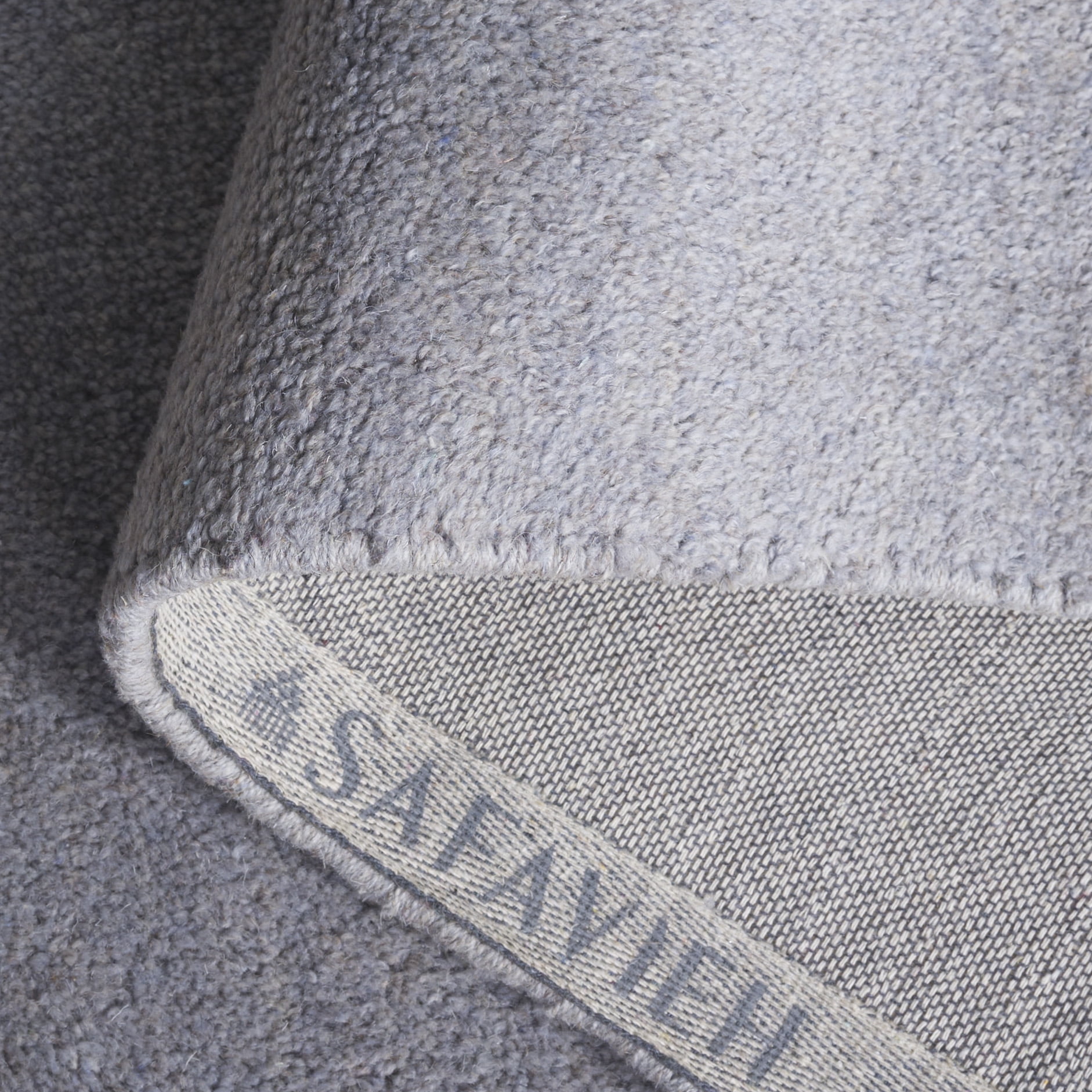 SAFAVIEH Himalaya Rachelle Solid Wool Area Rug, Grey, 6' x 9'