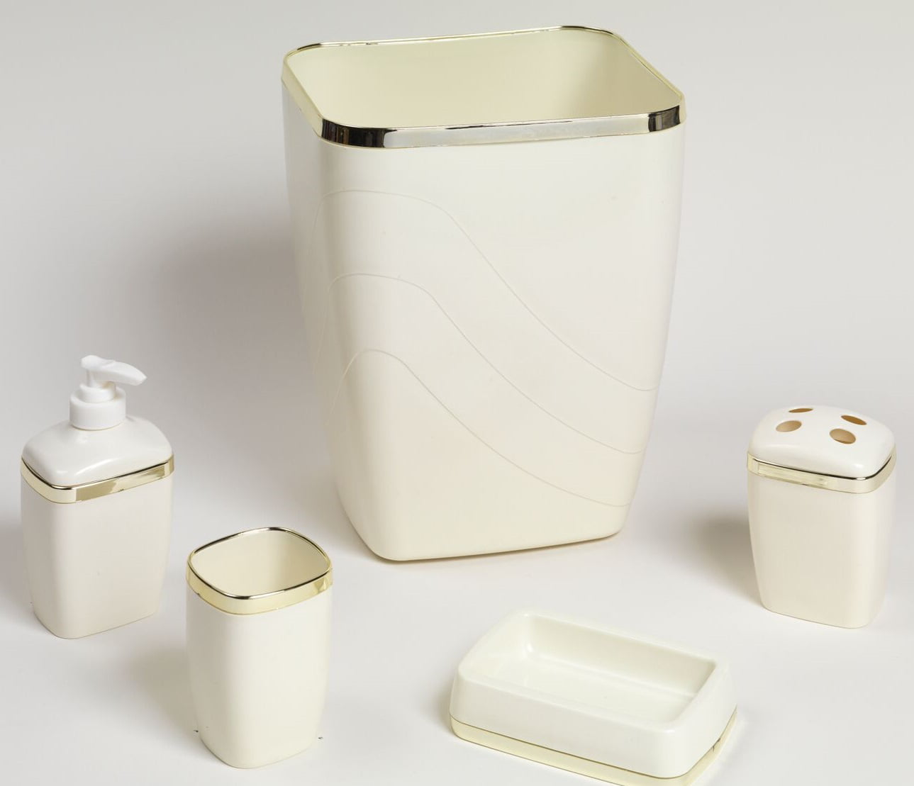 wastebasket... 5 piece plastic bath accessory set in ivory/gold which includes 