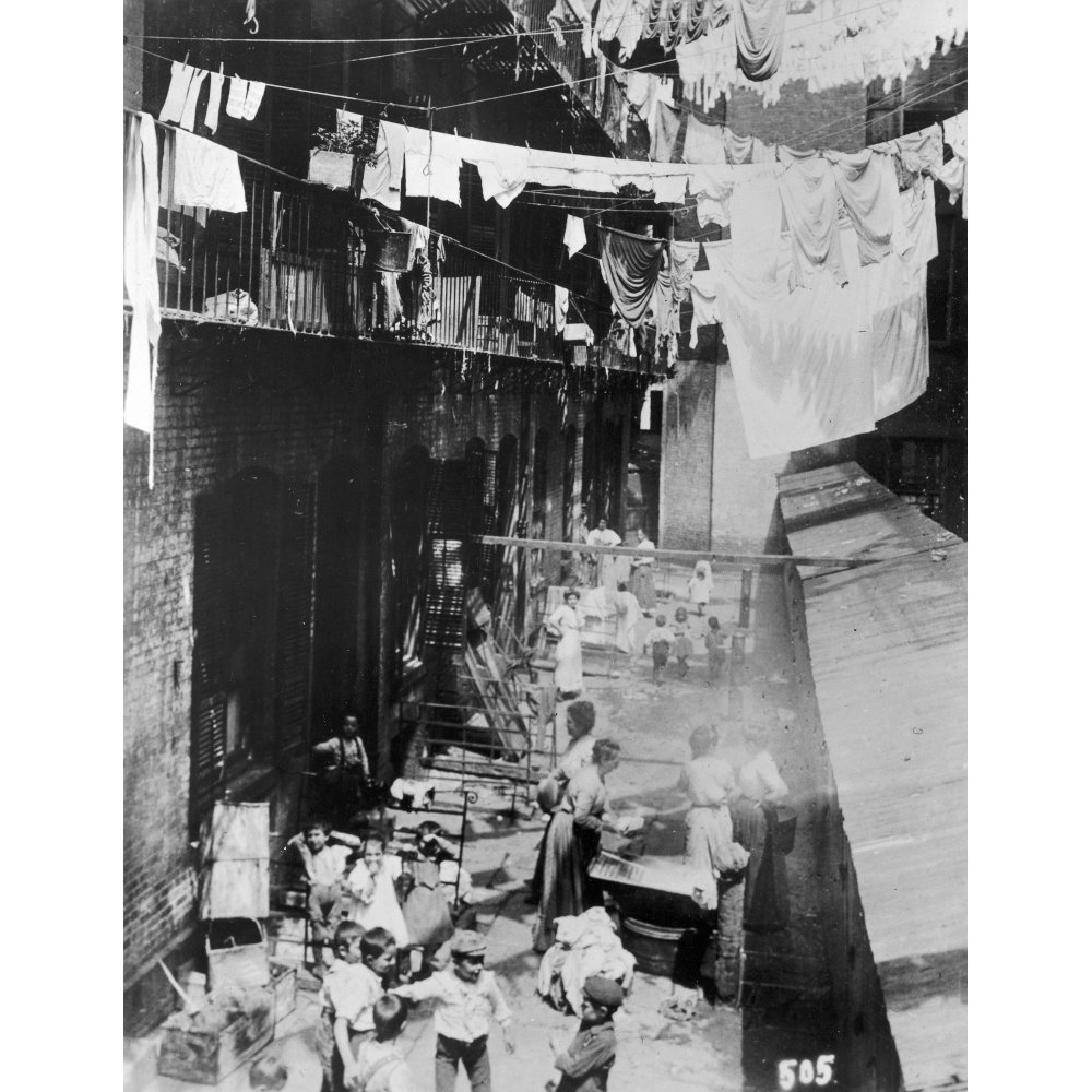 New York Tenement Yard. /Nwomen Doing Laundry In A Tenement Courtyard
