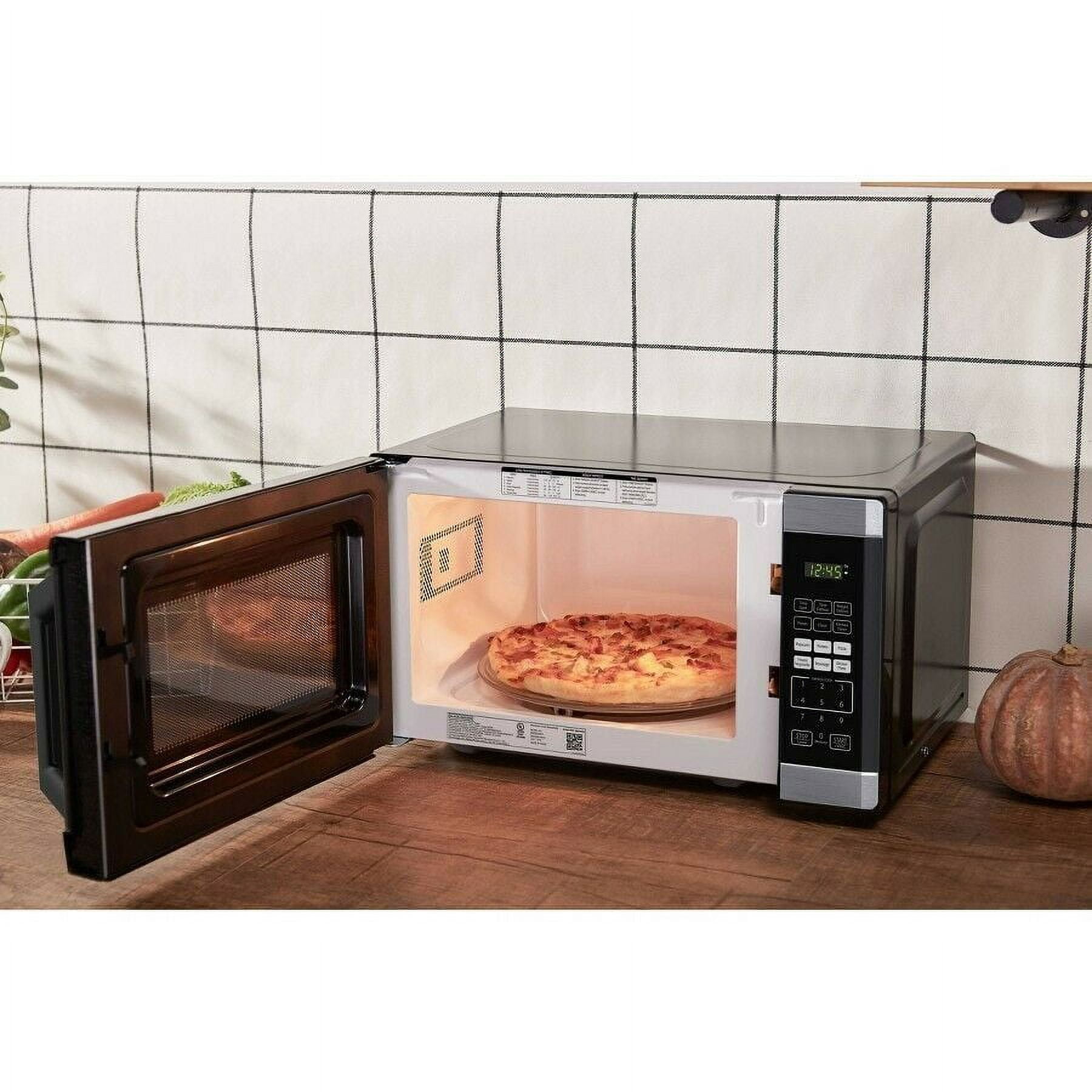 Home Centre Eastern Region Ltd - Black+Decker 0.9 Cu. Ft. Microwave  Time/weight defrost allows you to defrost frozen foods by simply entering  the weight or time Auto-menu function - sit back and