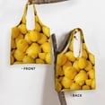 thumbnail image 3 of Xecao's Ripe Yellow Lemon Canvas Tote Bag is a versatile choice for women, serving as a stylish beach bag, shopping bag,and reusable grocery bag., 3 of 5