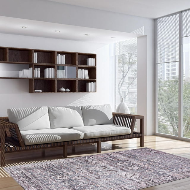 ECARPET Oriental indoor flatweave area rug from Sultan Collection displayed in a bright living room with wooden sofa and white cushions.