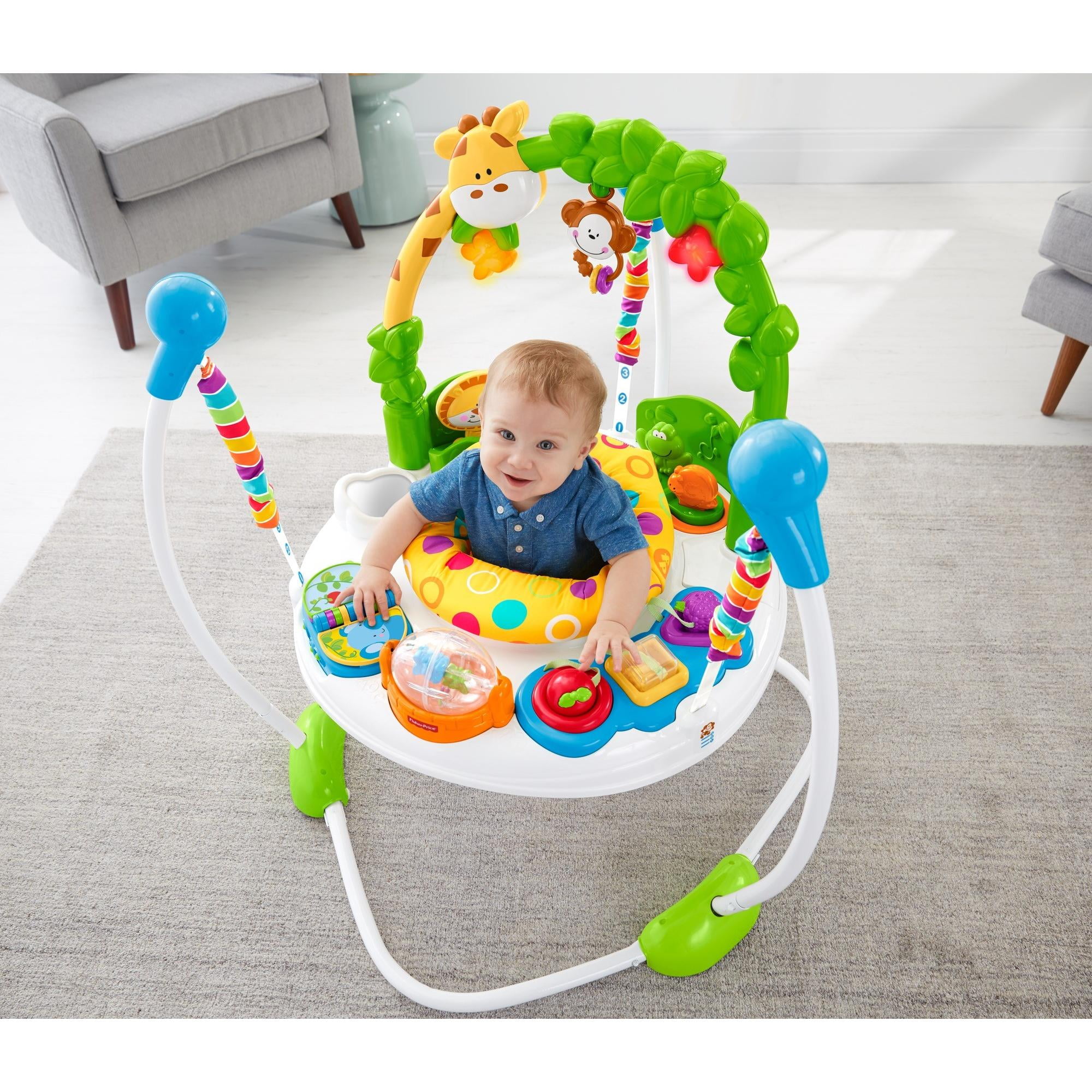 Скольки месяцев можно ходунки мальчика. Jumperoo Fisher Price. Игровой центр прыгунки Fisher Price. Ходунки для малышей. Детские ходунки для малышей.