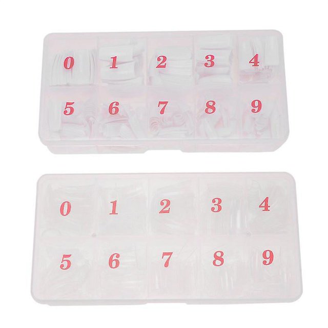 2 puntas de uñas artificiales.