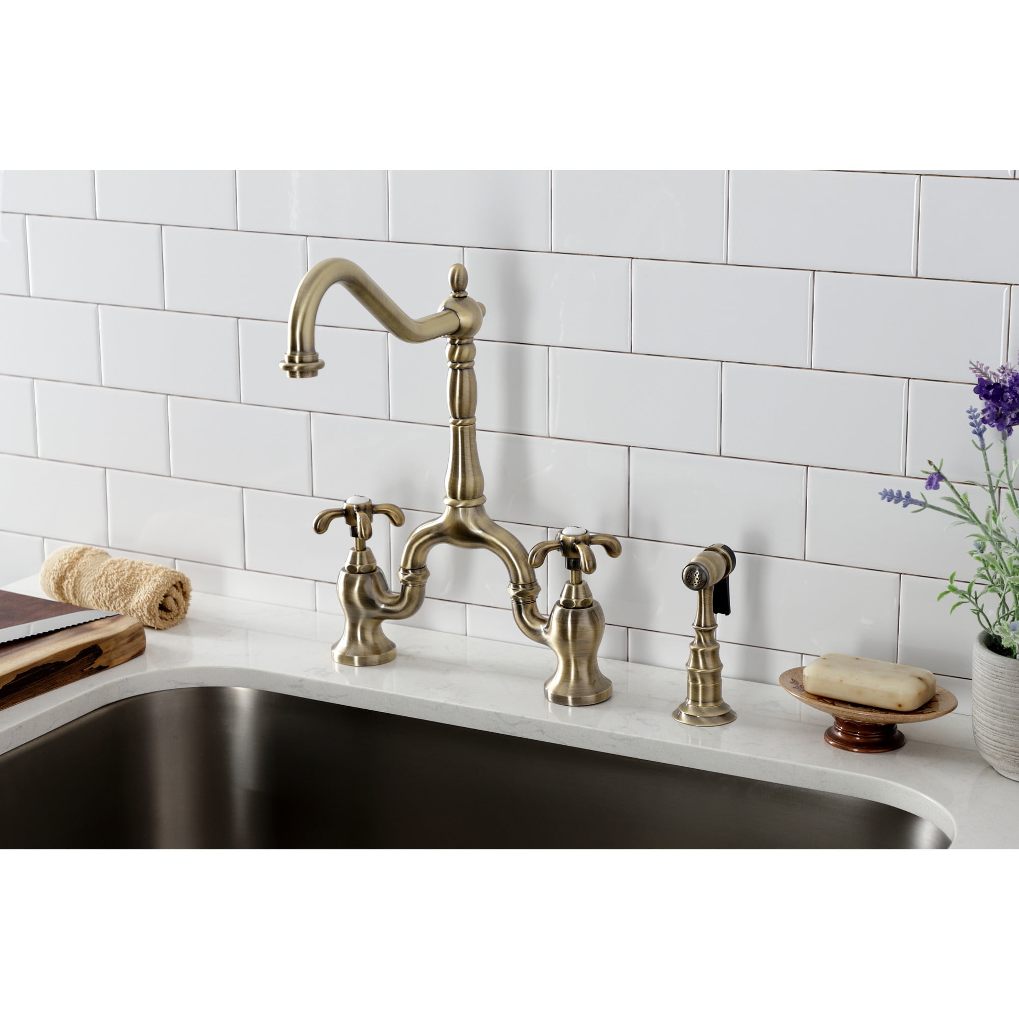 Kingston Brass KS7753TXBS French Country Two-Handle 3-Hole Deck Mount Bridge Kitchen Faucet with Brass Side Sprayer in Antique Brass