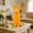 Orange, variant on Surpdew Easter Decorations Flocked Bunnies Figurine With Bow Tie 8.8" Flocking Rabbit Tabletop Ornament For Easter Centerpieces For Spring Home Office Table Decor, Party Supplies Green 8.7Inch
