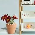 thumbnail image 2 of Casa de muñecas a escala 1:6, maceta con margaritas, accesorios para dormitorio y sala de estar, jardín. Rojo, 2 of 9