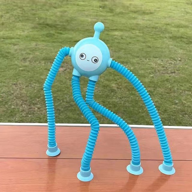 Juguete educativo con tubo telescópico de jirafa intercambiable que emite luz, juguete de descompresión interactivo entre padres e hijos con ventosa de dibujos animados