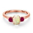 thumbnail image 3 of Gem Stone King 18K Rose Gold Plated Silver White Ethiopian Opal and Red Created Ruby Engagement Ring for Women | 1.01 Cttw | Oval Cabochon 7X5MM | Gemstone October Birthstone | Size 5, 3 of 6