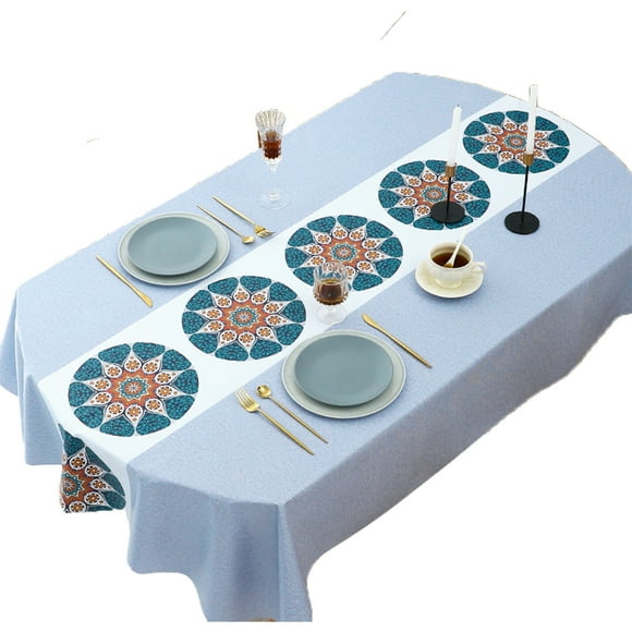 Richly colored flowers embroidered with creamy white oval tablecloth are produced