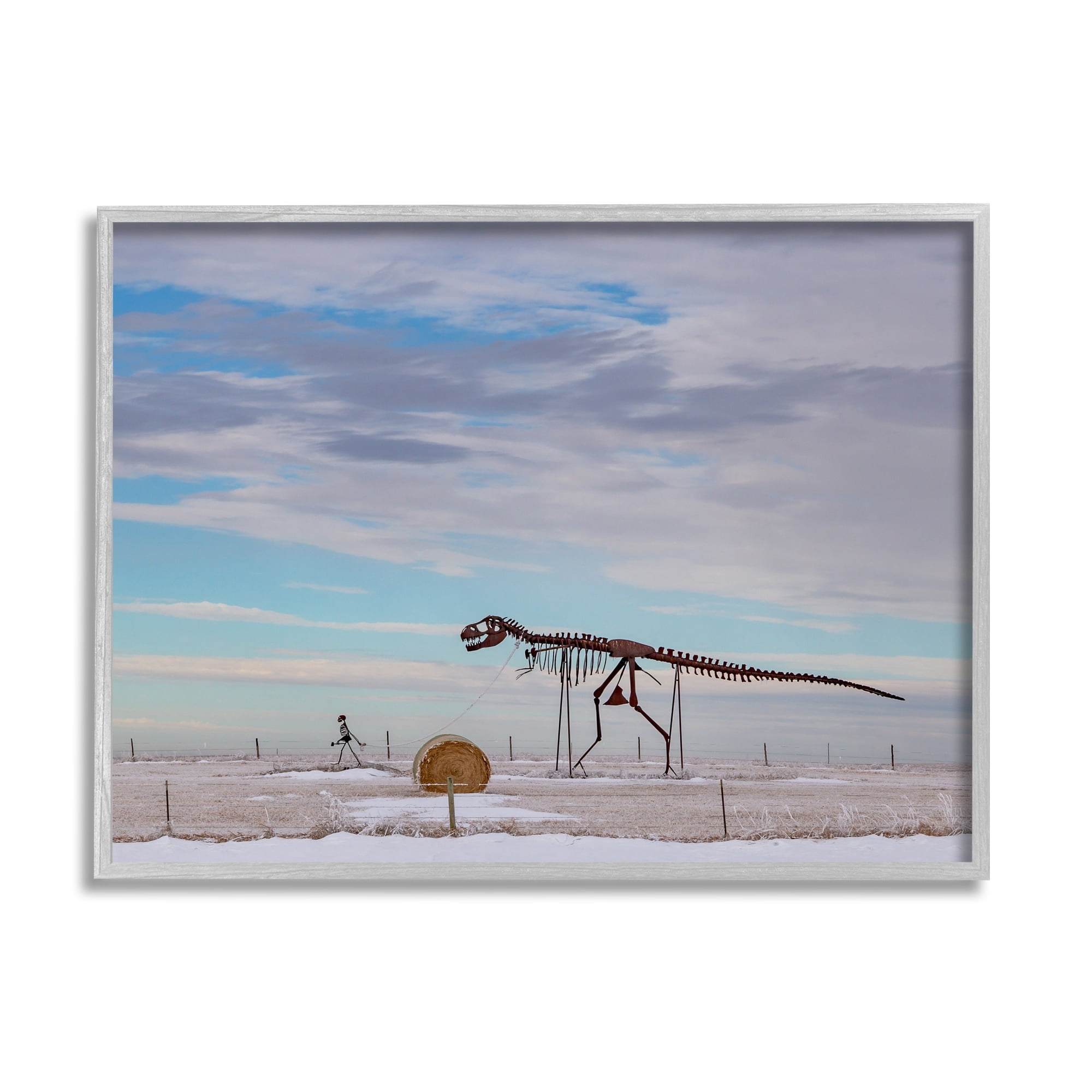 Stupell Industries Person Walking Dinosaur Skeleton Beach Sand Dunes Photograph Gray Framed Art Print Wall Art, Design by Jeff Poe Photography