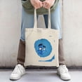 thumbnail image 2 of Blue Cartoon Face Tote Bag - Fun Exaggerated Features on a Gradient Blue Background Perfect for Shopping Travel and Parties, 2 of 4