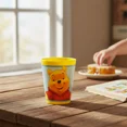 thumbnail image 2 of Set 12 Vasos Plástico Amarillos Diseño Winnie Pooh, 2 of 6