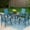 Blue, variant on Summit Living 5-Piece Outdoor Patio Dining Set with 4 Stackable Beige Aluminum Armchairs & 1 Black Metal Steel Table with Umbrella Hole