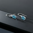 thumbnail image 5 of Gem Stone King 10K White Gold London Blue Topaz and White Created Sapphire Dangle Earrings for Women (2.70 Cttw, Gemstone Birthstone, Oval 8x6mm), 5 of 5
