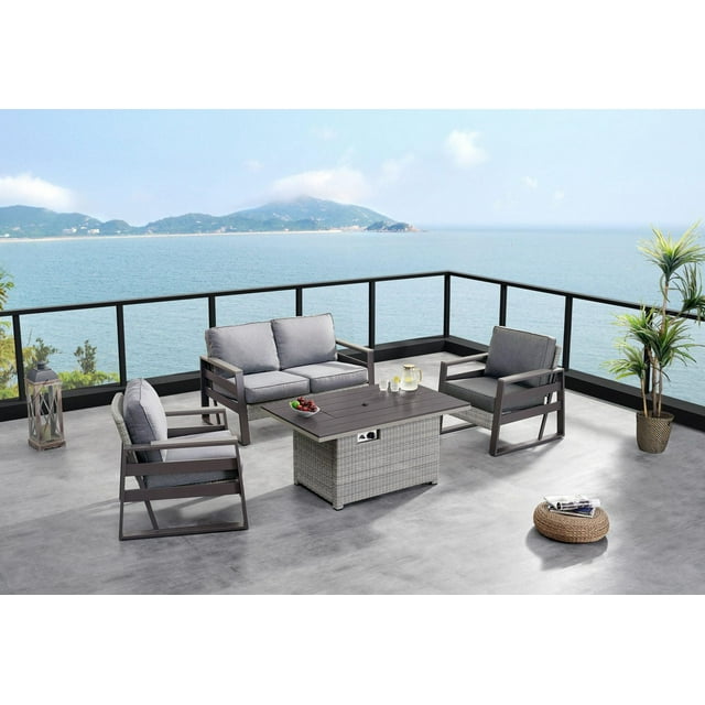 Deko Living 4 Place Seating Tricarico Outdoor Aluminum Sofa Conversation Set with Propane Gas Firepit Table in grey, featuring powder-coated aluminum frames and handwoven HDPE wicker, with weatherproof deep cushions, set on a concrete patio with ocean and mountain views, including a 50,000 BTU propane firepit table with a fireable top lid cover, suitable for outdoor relaxation and entertaining.