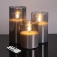 thumbnail image 1 of Juego de 3 velas sin llama de color gris ahumado de Lamp Eywamage con mando a distancia, 1 of 7
