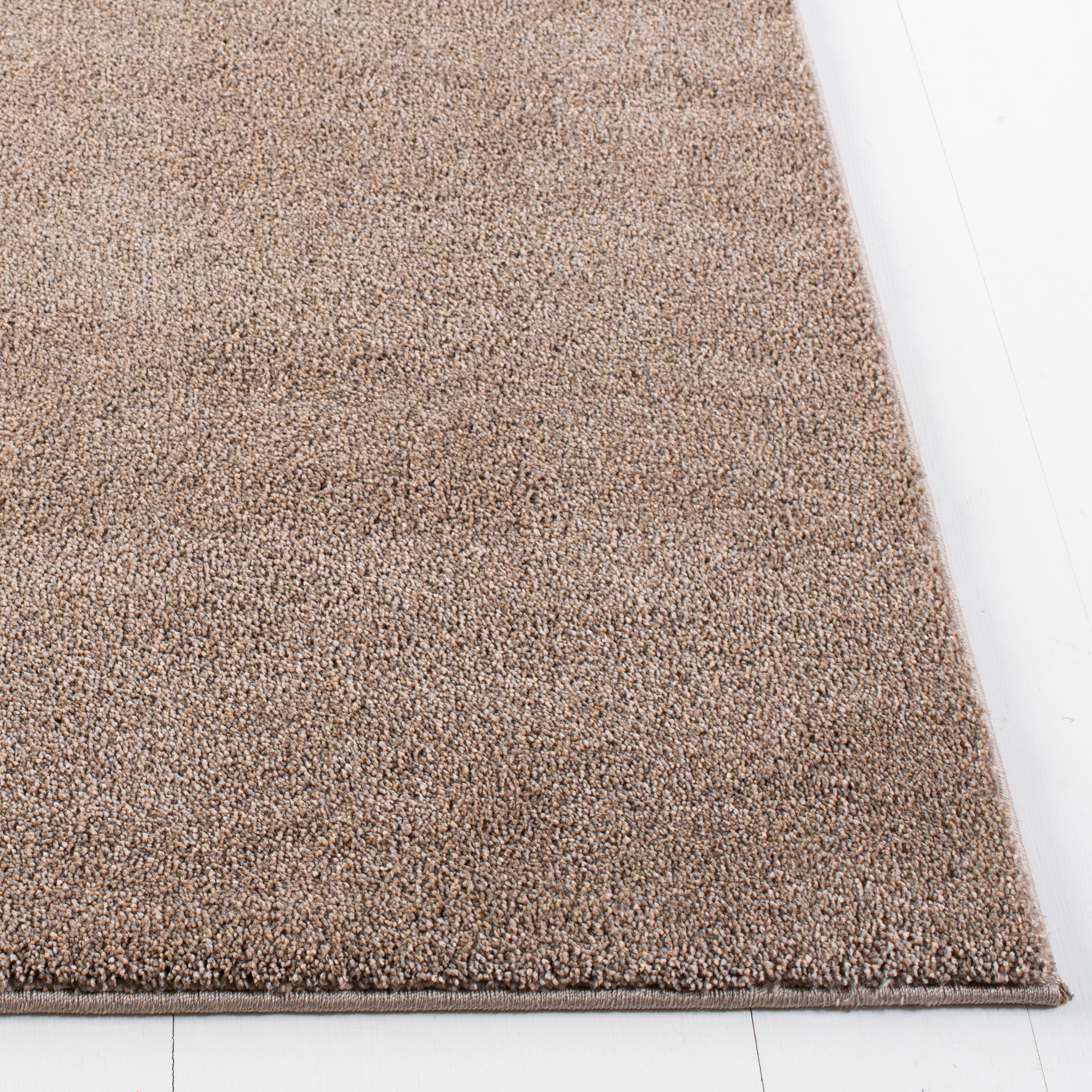 SAFAVIEH Plain and Solid Carleen Solid Plush Area Rug, Taupe, 9' x 12'