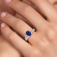 thumbnail image 4 of Gem Stone King 925 Sterling Silver Blue Created Sapphire and White Lab Grown Diamond 3 Stone Engagement Ring for Women | 1.68 Cttw | Oval 8X6MM | Round 2MM | Gemstone September Birthstone | Size 5, 4 of 6