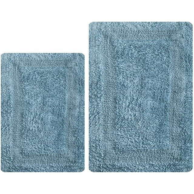 Thick Bathroom Rugs Set 2Piece in 100% Cotton, featuring two reversible bath rugs in spa blue. The set includes one rug measuring 21x34 inches and another 17x24 inches. Made from soft, absorbent cotton, these rugs are machine washable and ideal for bathrooms, entryways, or living rooms. The rugs lack a backing, so a non-skid rug pad is recommended for safety.