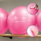 thumbnail image 3 of Pelota de Yoga Atom 55 cm con Bomba | Pilates y Fitness rosa, 3 of 8